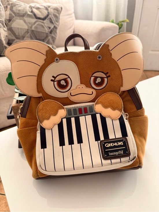 Loungefly Handbags - Loungefly Gremlins Piano Stripe Mini Backpack in Cream, Black & Brown